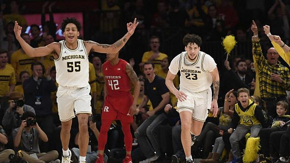 Eli Brooks (55) and Brandon Johns Jr. (23)