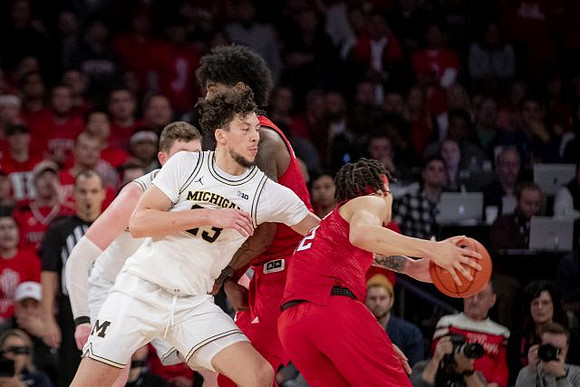 Jon Teske (15) and Brandon Johns Jr. (23)