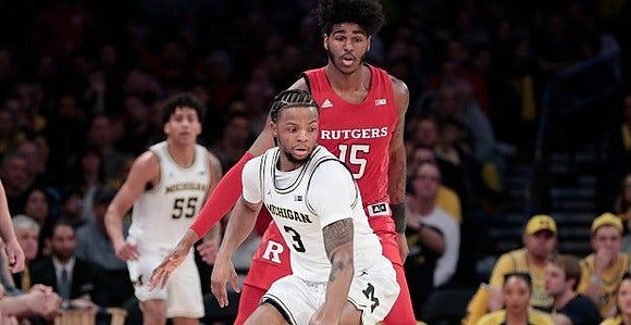 Zavier Simpson (3) and Eli Brooks (55)