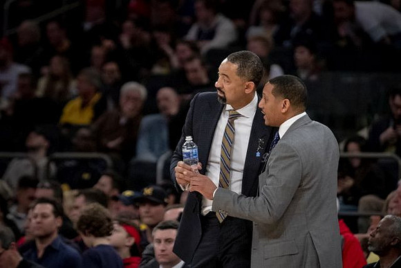 Juwan Howard and Howard Eisley