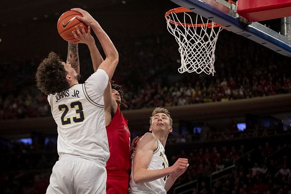 Brandon Johns Jr. (23) and Franz Wagner (21)