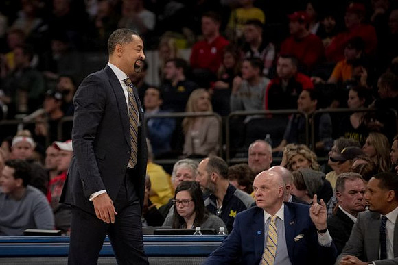 Juwan Howard, Phil Martelli, and Howard Eisley