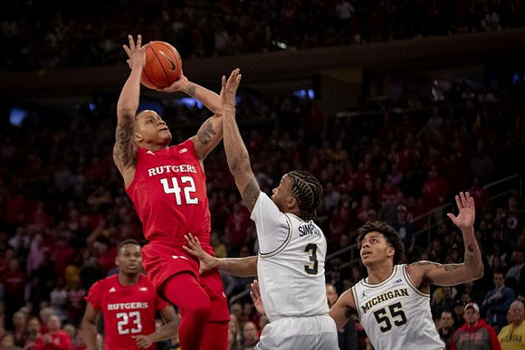 Zavier Simpson (3) and Eli Brooks (55)