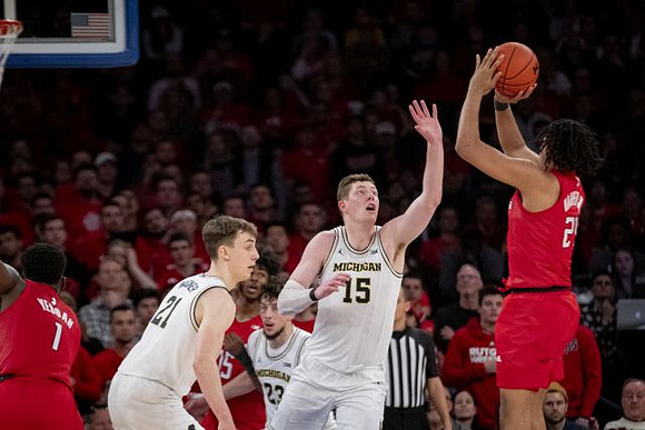 Franz Wagner (21), Brandon Johns Jr. (23), and Jon Teske (15)