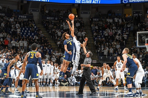 Charles Matthews (1), Zavier Simpson (3), Isaiah Livers (4), and Moritz Wagner (13)