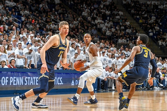 Moritz Wagner (13) and Zavier Simpson (3)