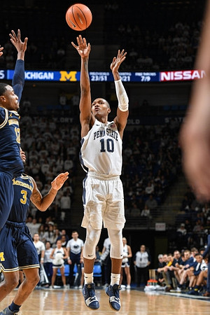 Muhammad-Ali Abdur-Rahkman (12) and Zavier Simpson (3)
