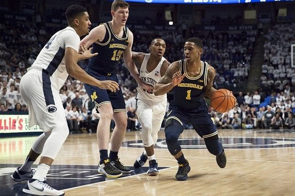 Jon Teske (15) and Charles Matthews (1)