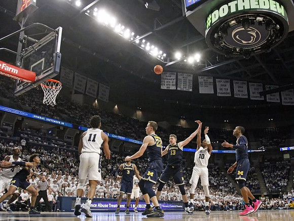 Jordan Poole (2), Zavier Simpson (3), Duncan Robinson (22), Moritz Wagner (13), and Muhammad-Ali Abdur-Rahkman (12)