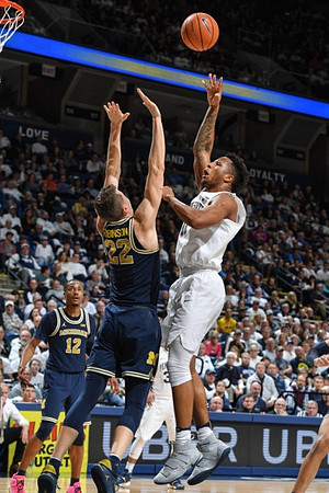 Muhammad-Ali Abdur-Rahkman (12) and Duncan Robinson (22)