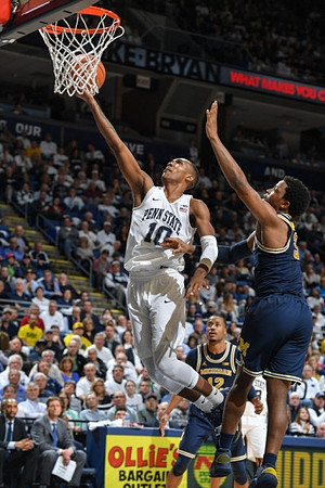 Muhammad-Ali Abdur-Rahkman (12) and Zavier Simpson (3)