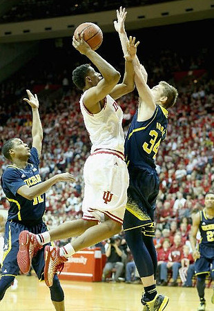 Muhammad-Ali Abdur-Rahkman (12), Mark Donnal (34), and Zak Irvin (21)