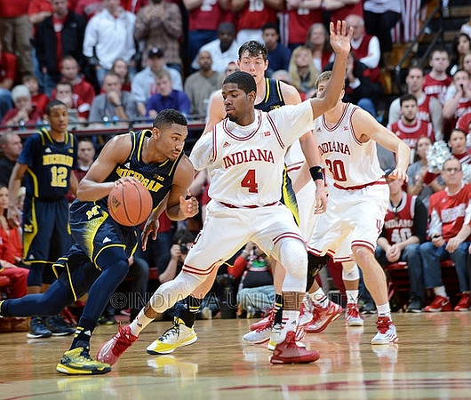 Muhammad-Ali Abdur-Rahkman (12), Zak Irvin (21), and Ricky Doyle (32)
