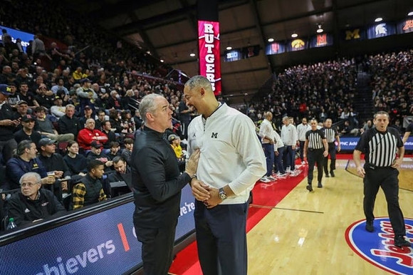 Rutgers Head Coach Steve Pikiell and Juwan Howard