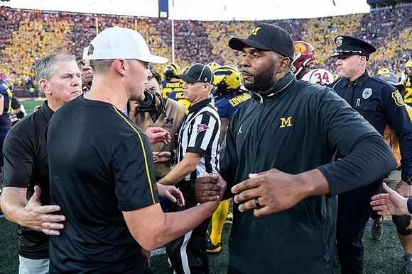 USC Head Coach Lincoln Riley and Sherrone Moore