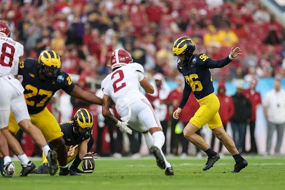 Tyler McLaurin (27), Hudson Hollenbeck (90), and Dominic Zvada (96)