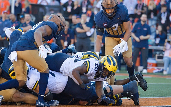Evan Link (71), Kalel Mullings (20), and Josh Priebe (68)