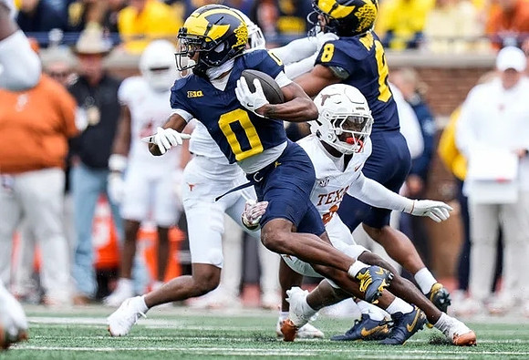 Semaj Morgan (0) and Tyler Morris (8)