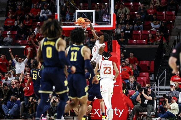 Dug McDaniel (0) and Isaiah Barnes (11)