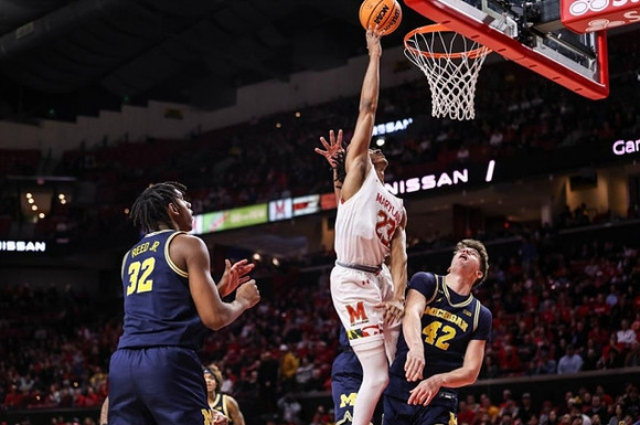 Tarris Reed Jr. (32) and Will Tschetter (42)
