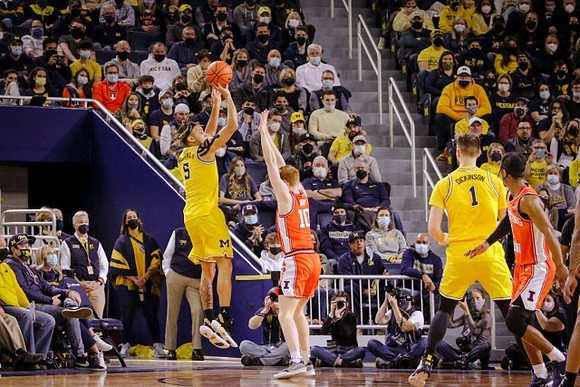 Terrance Williams II (5) and Hunter Dickinson (1)