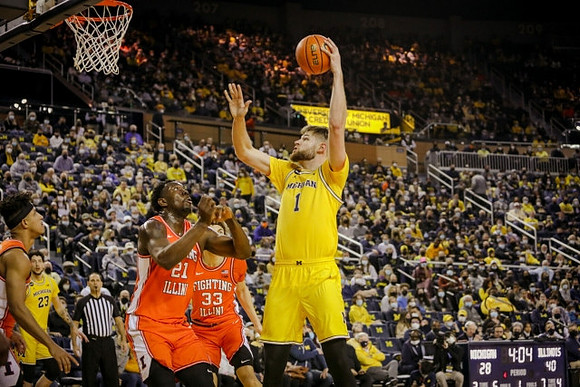 Hunter Dickinson (1) and Brandon Johns Jr. (23)