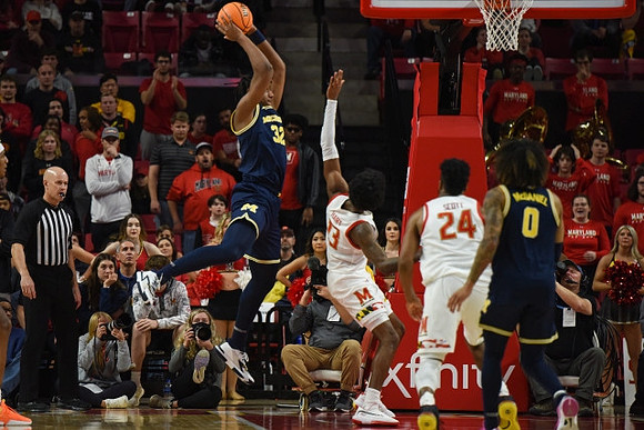 Tarris Reed Jr. (32) and Dug McDaniel (0)