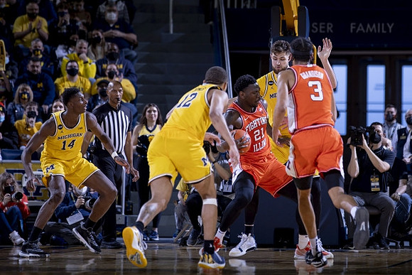 DeVante' Jones (12), Moussa Diabate (14), and Hunter Dickinson (1)