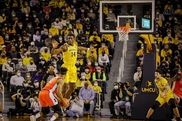 Moussa Diabate (14) and Brandon Johns Jr. (23)