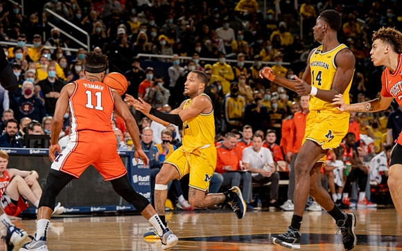 DeVante' Jones (12) and Moussa Diabate (14)