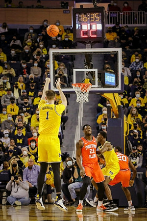 Hunter Dickinson (1) and Moussa Diabate (14)