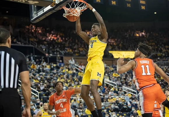 Moussa Diabate (14) and DeVante' Jones (12)