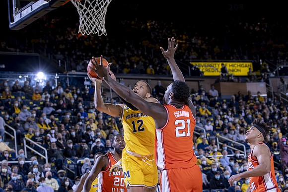 DeVante' Jones (12) and Moussa Diabate (14)