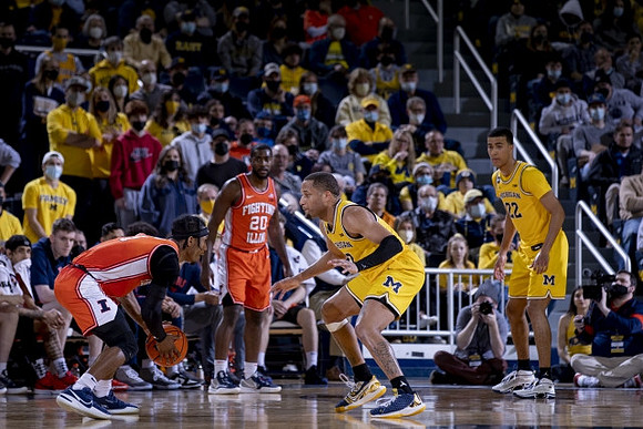 DeVante' Jones (12) and Caleb Houstan (22)