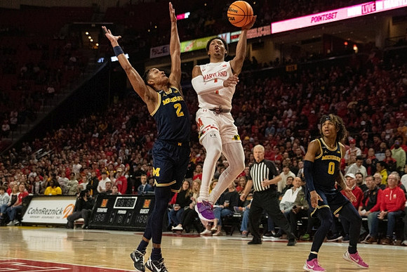 Kobe Bufkin (2) and Dug McDaniel (0)