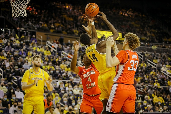 Hunter Dickinson (1) and Moussa Diabate (14)