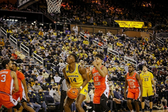 Moussa Diabate (14) and Brandon Johns Jr. (23)
