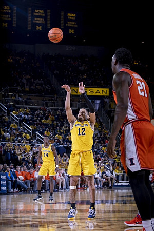 DeVante' Jones (12) and Moussa Diabate (14)