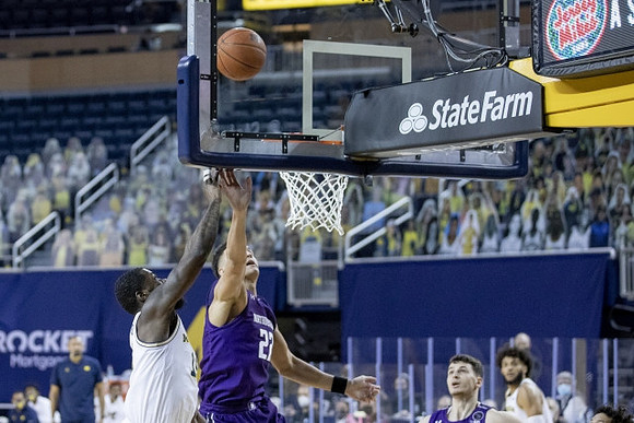 Chaundee Brown Jr. (15) and Isaiah Livers (2)