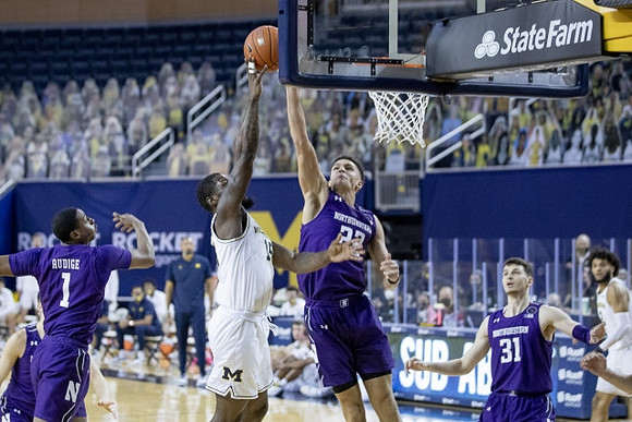Chaundee Brown Jr. (15) and Isaiah Livers (2)