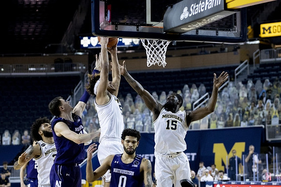 Isaiah Livers (2), Terrance Williams II (5), and Chaundee Brown Jr. (15)