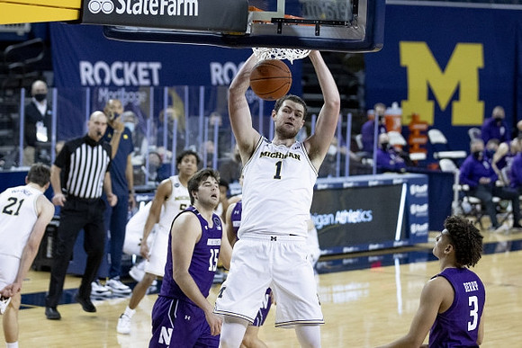 Franz Wagner (21), Eli Brooks (55), and Hunter Dickinson (1)