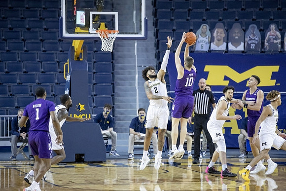 Chaundee Brown Jr. (15), Isaiah Livers (2), Brandon Johns Jr. (23), and Terrance Williams II (5)