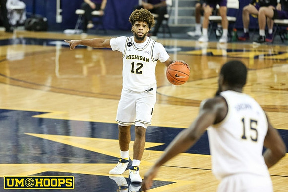 Mike Smith (12) and Chaundee Brown Jr. (15)