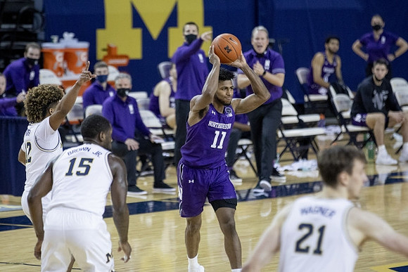 Mike Smith (12), Chaundee Brown Jr. (15), and Franz Wagner (21)