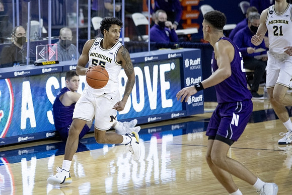 Eli Brooks (55) and Franz Wagner (21)