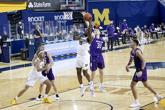 Terrance Williams II (5) and Chaundee Brown Jr. (15)