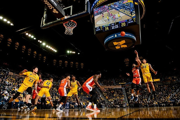 Brandon Johns Jr. (23), DeVante' Jones (12), Moussa Diabate (14), and Eli Brooks (55)