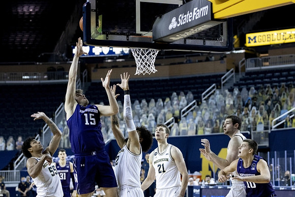 Eli Brooks (55), Mike Smith (12), Franz Wagner (21), and Hunter Dickinson (1)