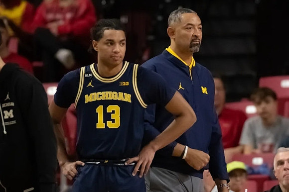 Jett Howard (13) and Juwan Howard